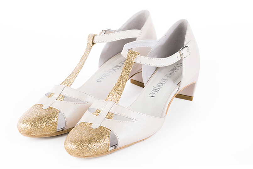 Gold and off white women's T-strap open side shoes. Round toe. Low comma heels. Front view - Florence KOOIJMAN